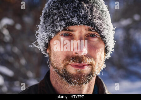 Portrait of man with frost covered face Stock Photo