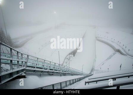 Holmenkollen ski jump in foggy winter day, Oslo, Norway Stock Photo