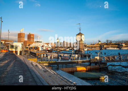 OSLO, NORWAY - JANUARY 29: Ships and boats in port of Oslo on sunny winter day on January 29, 2015 Stock Photo