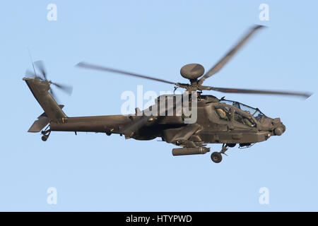 Army Air Corps Apache AH1 turning in for landing at Wattisham airfield. Stock Photo