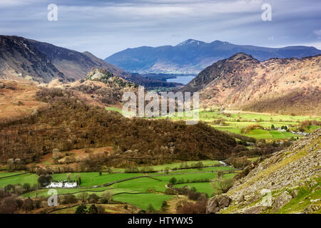 North Lake District Fells in Cumbria viewed from Rosthwaite Fell over Borrowdale towards Castle Crag Derwent Water and Skiddaw Stock Photo