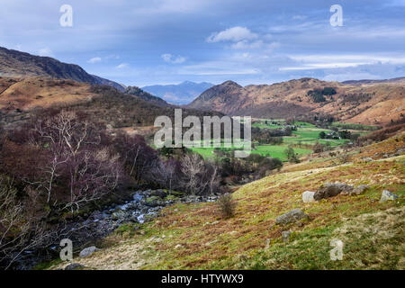 North Lake District Fells in Cumbria viewed from Rosthwaite Fell over Borrowdale towards Castle Crag Derwent Water and Skiddaw Stock Photo