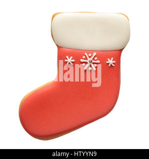 Red Christmas gingerbread sock with snowflake isolated on white background. Stock Photo