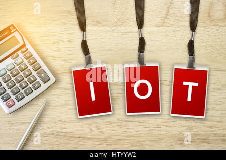 IOT or Internet of Things word on red badge with soft light vintage effect Stock Photo