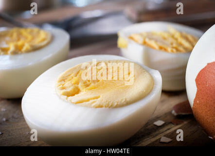 Hard boiled eggs on wooden background Stock Photo