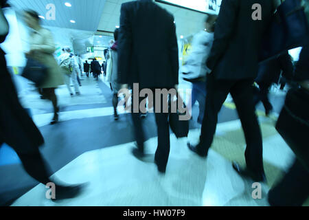 People walking underground in Tokyo, Japan Stock Photo