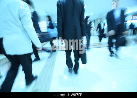 People walking underground in Tokyo, Japan Stock Photo