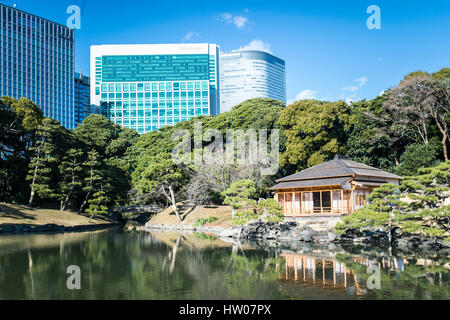 Old and modern architecture. 30 December 2016 Photo taken at the Hamarikyu Gardens, a public park in Tokyo, Japan. Located at the mouth of the Sumida  Stock Photo