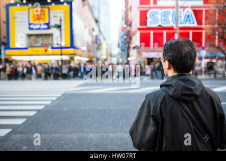 TOKYO, AKIHABARA. JANUARY 10, 2017. People are waiting to cross the street .  Akihabara is the The video game district in Tokyo. Akihabara gained the  Stock Photo