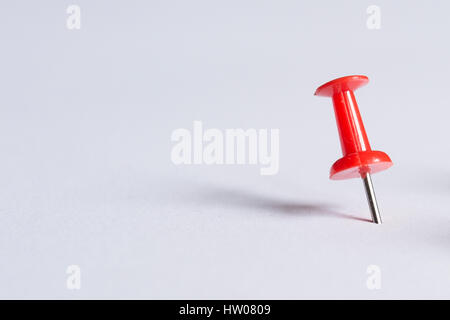 Set of push pins in different colors, with real shadows, isolated on white background. (Selective Focus) Stock Photo