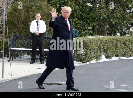 Washington DC, USA 15th March 2017 United States President Donald J Trump walks on the South Lawn of the White House toward Marine One as he departs the White House on March 15, 2017 in Washington, DC The President will attend events in Michigan and Tenne