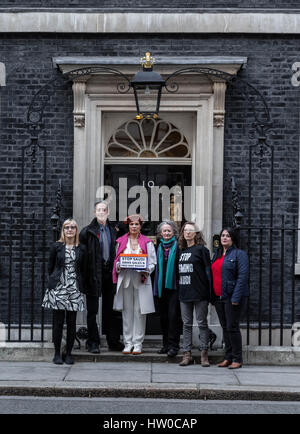 London, UK. 15th Mar, 2017. Bianca Jagger joins Human Rights campaigner Peter Tatchell with Green Party's Jenny Jones to hand in a 159,000-signature petition to Prime Minister Theresa May at 10 Downing Street. The petition, organised by Peter Tatchell, urges the UK government to halt arms sales to Saudi Arabia over its war crimes to Yemen and its jailing of blogger Raif Badawi and other political prisoners. Credit: Guy Corbishley/Alamy Live News Stock Photo