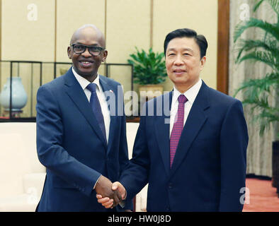 Beijing, China. 16th Mar, 2017. Chinese Vice President Li Yuanchao (R) meets with Burundian Minister of External Relations and International Cooperation Alain Aime Nyamitwe, in Beijing, capital of China, March 16, 2017. Credit: Yao Dawei/Xinhua/Alamy Live News Stock Photo