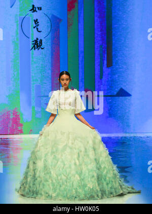 Beijing, China. 16th Mar, 2017. A model presents a fashion design during a graduation design show at the Beijing Institute of Fashion Technology (BIFT) in Beijing, capital of China, March 16, 2017. Credit: Li Jianbo/Xinhua/Alamy Live News Stock Photo