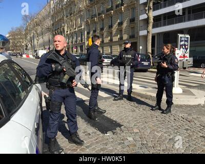 Paris, France. 16th Mar, 2017. Policemen block the access to the International Monetary Fund (IMF) office after an explosion in central Paris, France, on March 16, 2017. One person was injured on Thursday after an envelope exploded at the International Monetary Fund (IMF) office in central Paris, according to local media. Credit: Han Bing/Xinhua/Alamy Live News Stock Photo