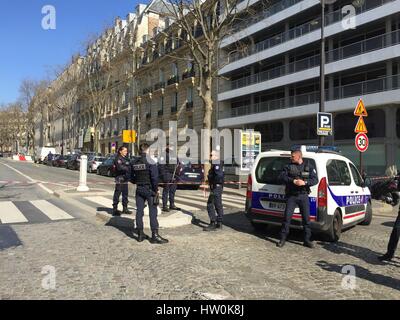 Paris, France. 16th Mar, 2017. Policemen block the access to the International Monetary Fund (IMF) office after an explosion in central Paris, France, on March 16, 2017. One person was injured on Thursday after an envelope exploded at the International Monetary Fund (IMF) office in central Paris, according to local media. Credit: Han Bing/Xinhua/Alamy Live News Stock Photo