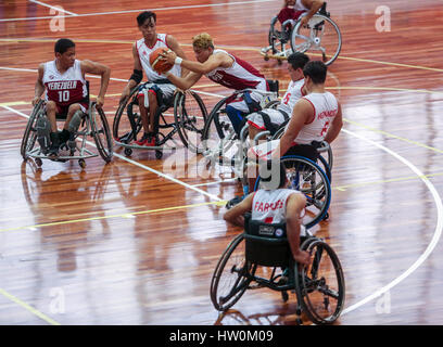 Sao Paulo, Brazil. 22nd Mar, 2017. Athletes take part in the Wheelchair Basketball match between Chile and Venezuela during the Sao Paulo 2017 Youth Parapan American Games, in the Brazilian Paralympic Training Centre in Sao Paulo, Brazil, on March 22, 2017. The Sao Paulo 2017 Youth Parapan American Games is held from March 20 to March 25. Credit: Rahel Patrasso/Xinhua/Alamy Live News Stock Photo