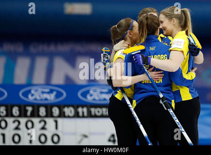 Beijing, China. 23rd Mar, 2017. Players of Sweden celebrate after the World Women's Curling Championship round-robin match against China in Beijing, capital of China, March 23, 2017. Sweden won 10-4 . Credit: Wang Lili/Xinhua/Alamy Live News Stock Photo