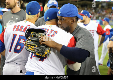 Los Angeles, California, USA. 22nd Mar, 2017. USA and Puerto Rico players exchange hugs and handshakes after the game between the the United States and Puerto Rico, World Baseball Classic Finals, Dodger Stadium in Los Angeles, CA. Peter Joneleit /CSM/Alamy Live News Stock Photo