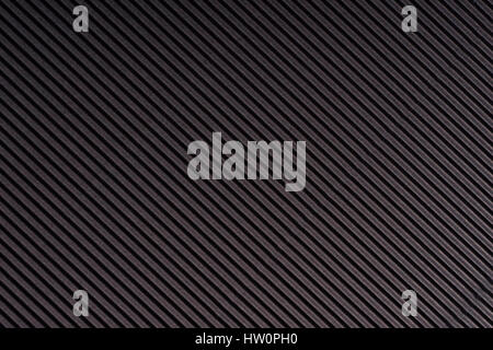 Striped dark gray embossed paper. Colored paper. Black texture background Stock Photo