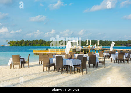 Maldives, Rangali Island. Conrad Hilton Resort. Restaurant on the beach. Stock Photo