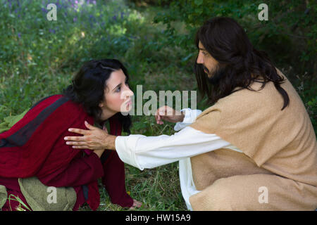 Repentant Sinner Woman Touching The Robe Of Jesus Asking For Forgiveness And Healing Stock