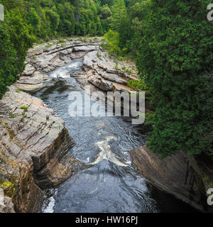 Jacque Cartier River Gorge viewed from an old Chemin du Roy road bridge. Site patrimonial de pêche Déry Stock Photo