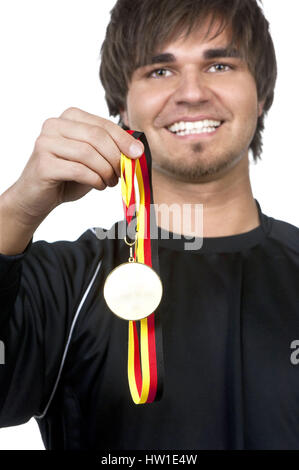 Medallion, Medaille     Siegertyp mit Medaille Stock Photo
