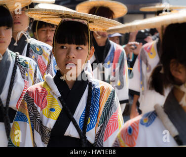 Takayama, Japan - October 9, 2015: Young local dancer in traditional clothing during annual Takayama festival, one of the most famous festivals in Jap Stock Photo