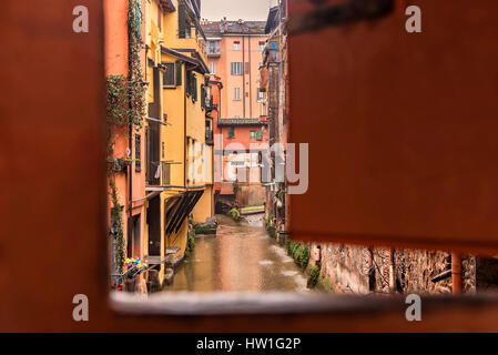 The hidden canal in an old neighbourhood in Bologna, Italy. Stock Photo
