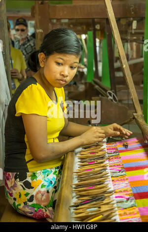 Silk Weaving Factory Worker near Amarapura, Myanmar Stock Photo