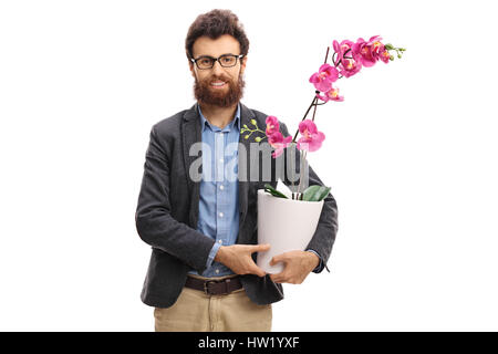 Man holding an orchid flower in a pot isolated on white background Stock Photo