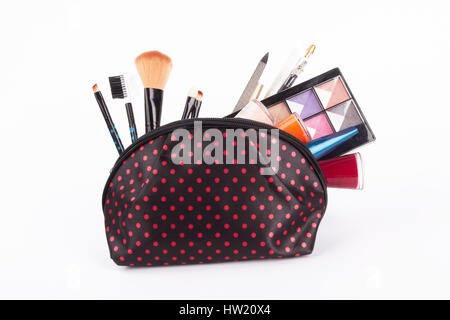 cosmetics bag with cosmetic on white Stock Photo
