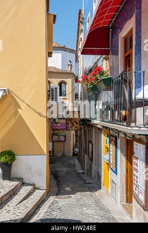 Portugal , Sintra . The ancient city of castles and palaces , stone houses whose roofs are made of tiles , narrow streets . Stock Photo