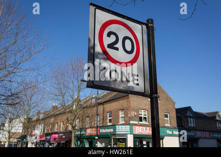 A 20mph speed limit signpost and local shops on Lordship Lane, in East Dulwich, on 15th March 2017, London borough of Southwark, England. Stock Photo
