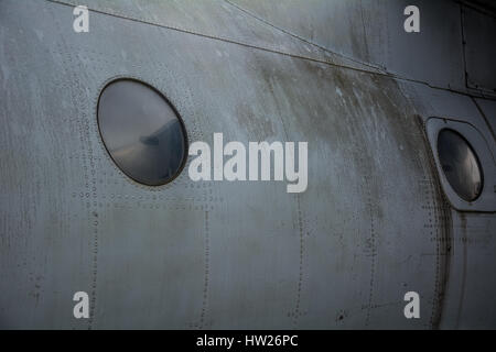 Old airplane porthole Stock Photo