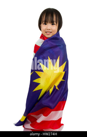 Portrait Of Girl Holding Malaysian Flag On Jungle Gym At 