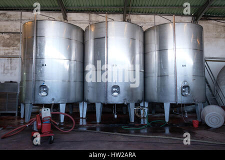 Stainless steel vats for wine fermentation at Caves Primavera in the Bairrada region of Portugal, Europe Stock Photo