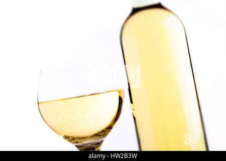 white wine glass and bottle - tilt shift selective focus effect Stock Photo