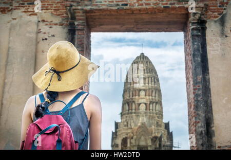 Girl exploring the ancient Ayutthaya city in Thailand Stock Photo