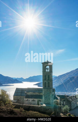 Sun in blue sky over Gravedona, Lake Como, Italy Stock Photo