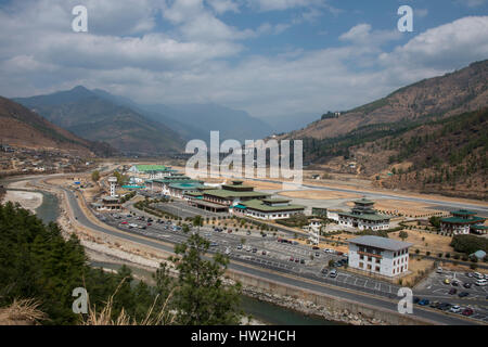 Bhutan, Paro. Paro Airport, is the only international airport in the Kingdom of Bhutan. It's considered one of the world's most challenging airports,  Stock Photo