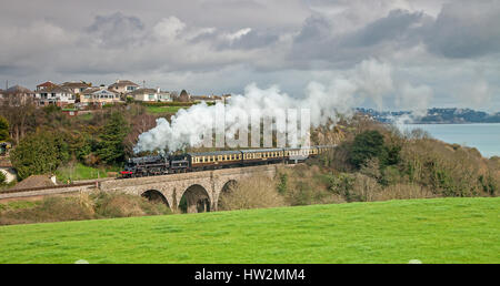 75014 crosses Broadsands Viaduct in Devon during a Timeline photo charter on 12 March 2017. The loco is about to start its first full season running t Stock Photo