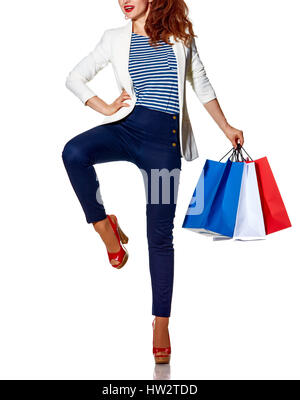 Shopping. The French way. Closeup on young woman with French flag colours shopping bags posing on white background Stock Photo