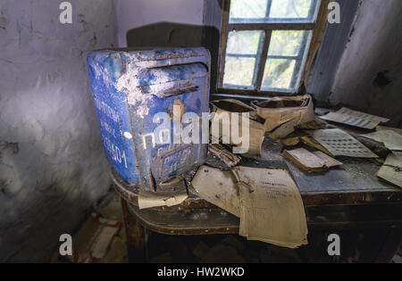 Old letter box in Post Office building in Krasne, one of abandoned villages of Chernobyl Nuclear Power Plant Zone of Alienation, Ukraine Stock Photo