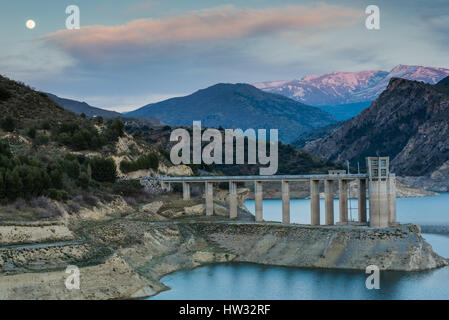 Reservoir Embalse de Canales in Granada, Spain at evening Stock Photo