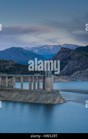 Reservoir Embalse de Canales in Granada, Spain at evening Stock Photo