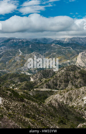 Sierra de Tejeda, Almijara y Alhama Mountains near Nerja, Spain. Panoramic vista over mountains in sunny day. Stock Photo