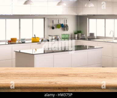 empty wooden counter top with kitchen background Stock Photo