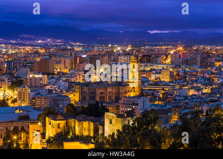 Malaga cathedral and cityscape at twilight from aerial view Stock Photo